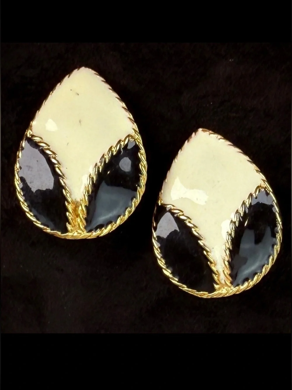 Vintage goldtone, black and cream enamel clip on earrings